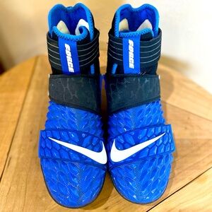 Blue Nike savage force II football cleats. Size 9.
